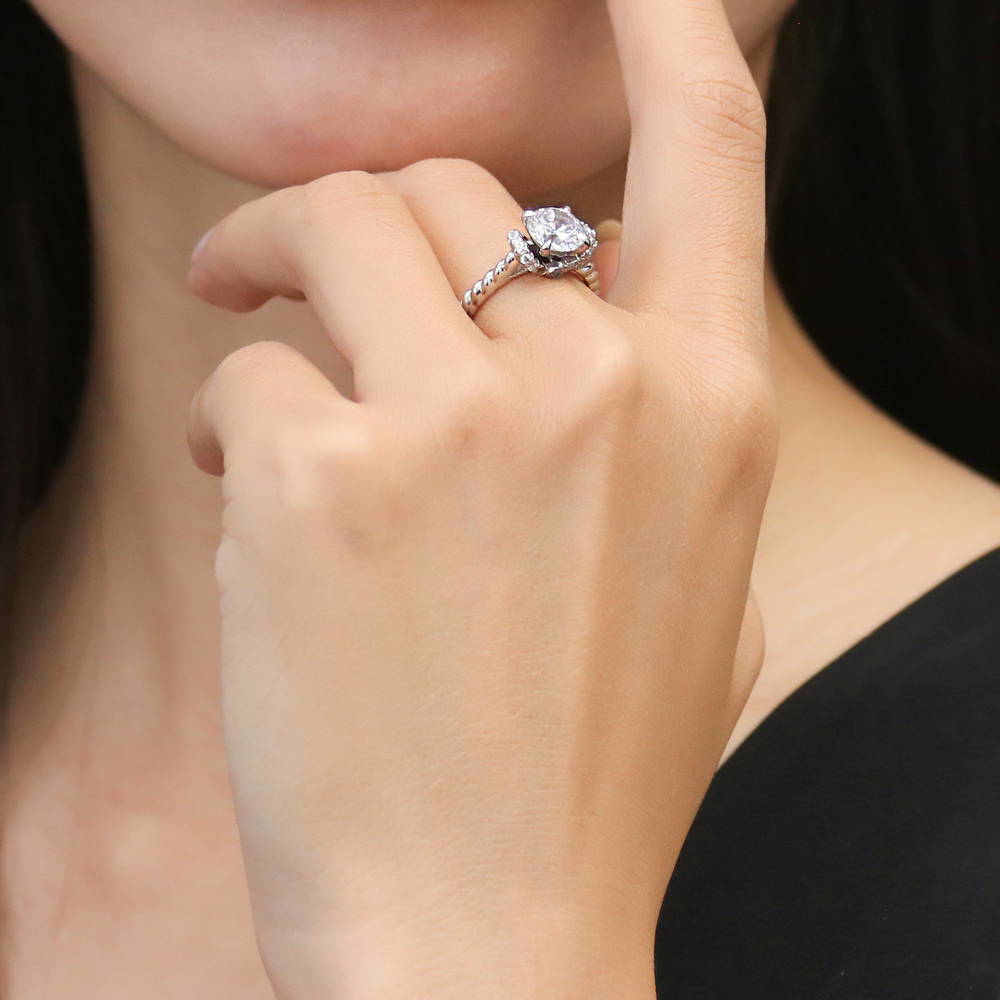 Model wearing Woven Solitaire CZ Ring in Sterling Silver