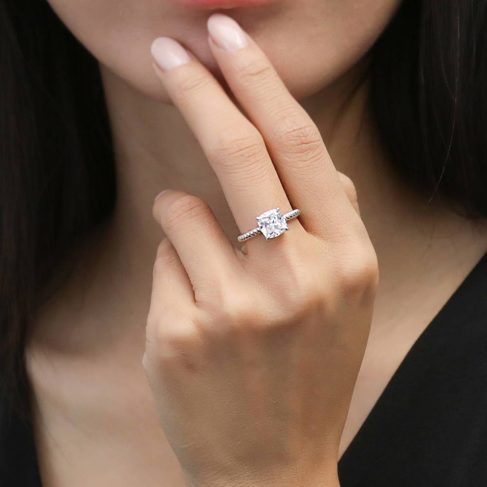 Model wearing Woven Solitaire CZ Ring in Sterling Silver