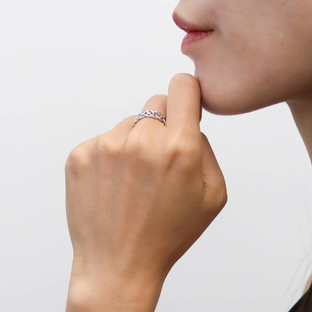 Model wearing Woven Celtic Knot Band in Sterling Silver, 3 of 8
