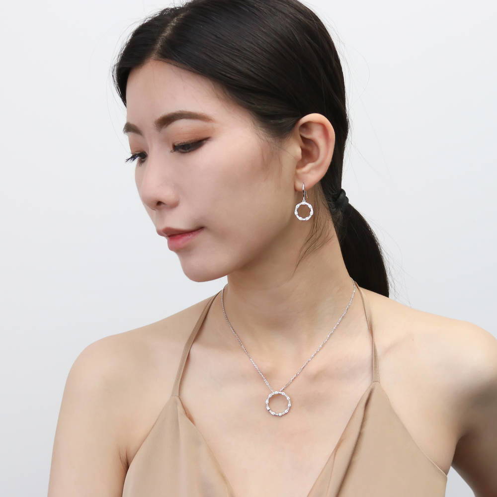 Model wearing Open Circle CZ Pendant Necklace in Sterling Silver, 6 of 10