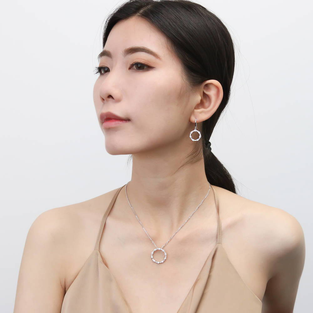 Model wearing Open Circle CZ Pendant Necklace in Sterling Silver, 3 of 10