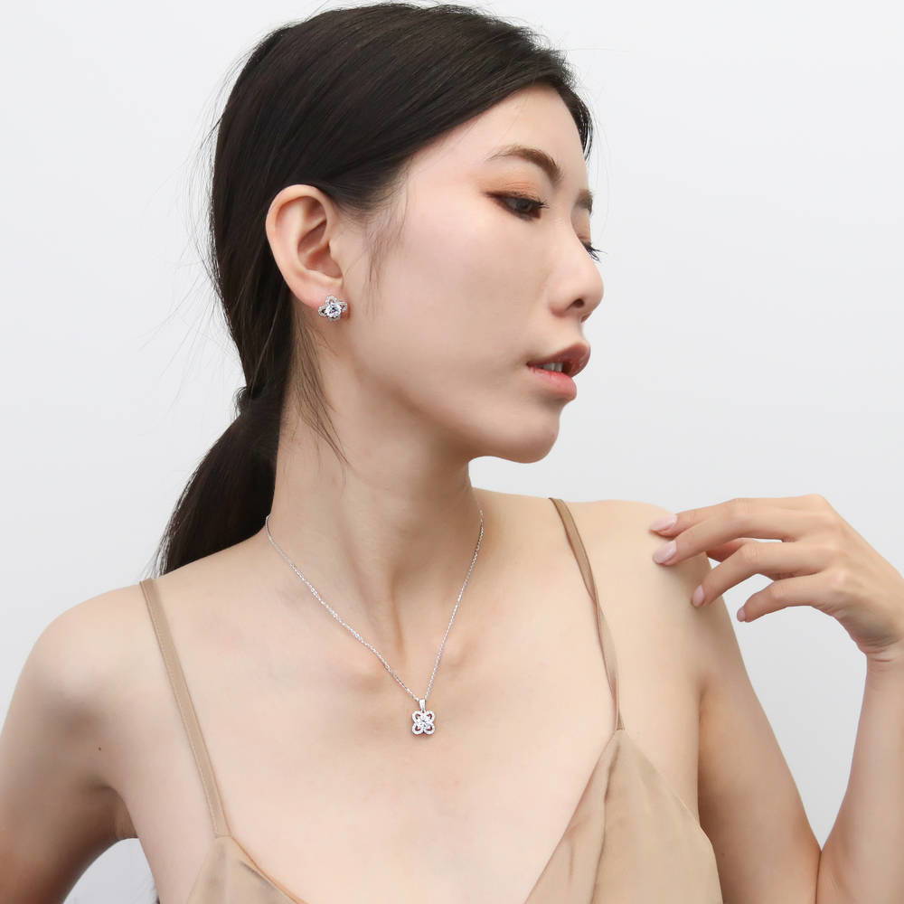 Model wearing Flower Halo CZ Necklace and Earrings Set in Sterling Silver, 3 of 10