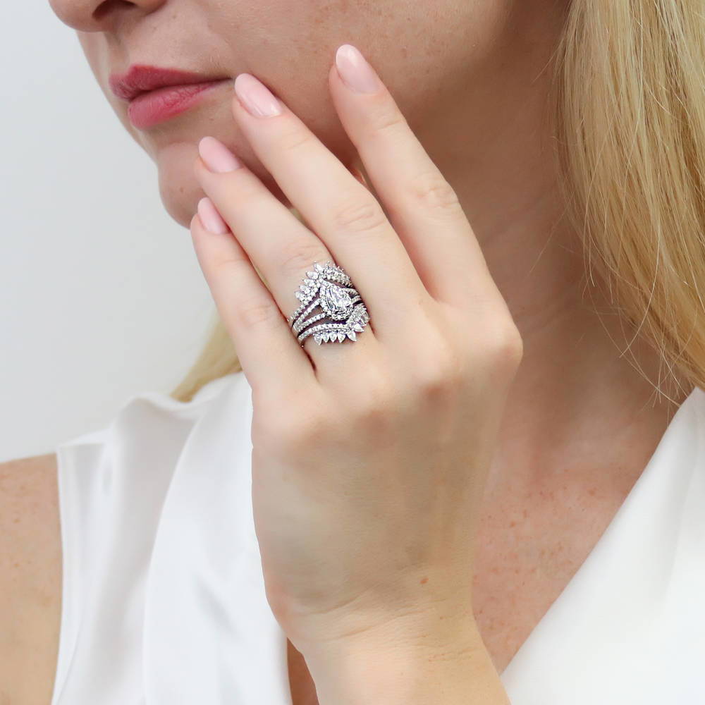 Model wearing Halo Pear CZ Split Shank Ring Set in Sterling Silver