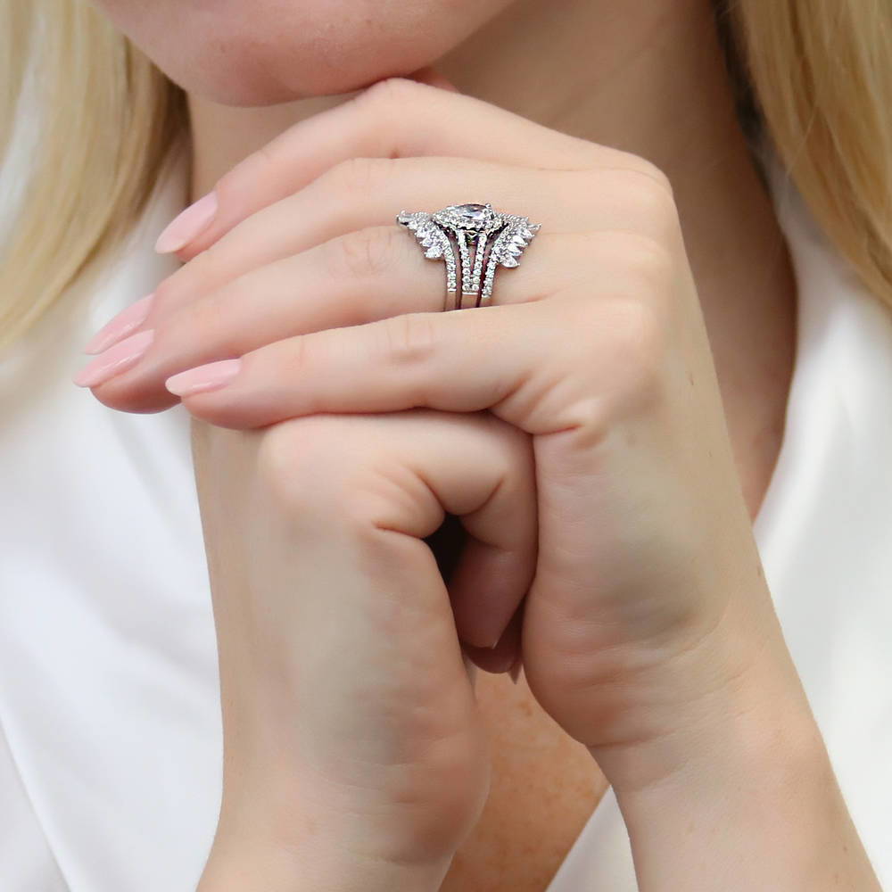 Model wearing Halo Pear CZ Split Shank Ring Set in Sterling Silver