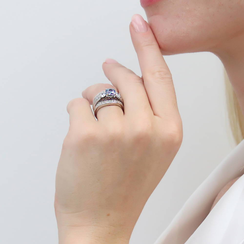 Model wearing 3-Stone Kaleidoscope Purple Aqua CZ Ring in Sterling Silver, 15 of 17
