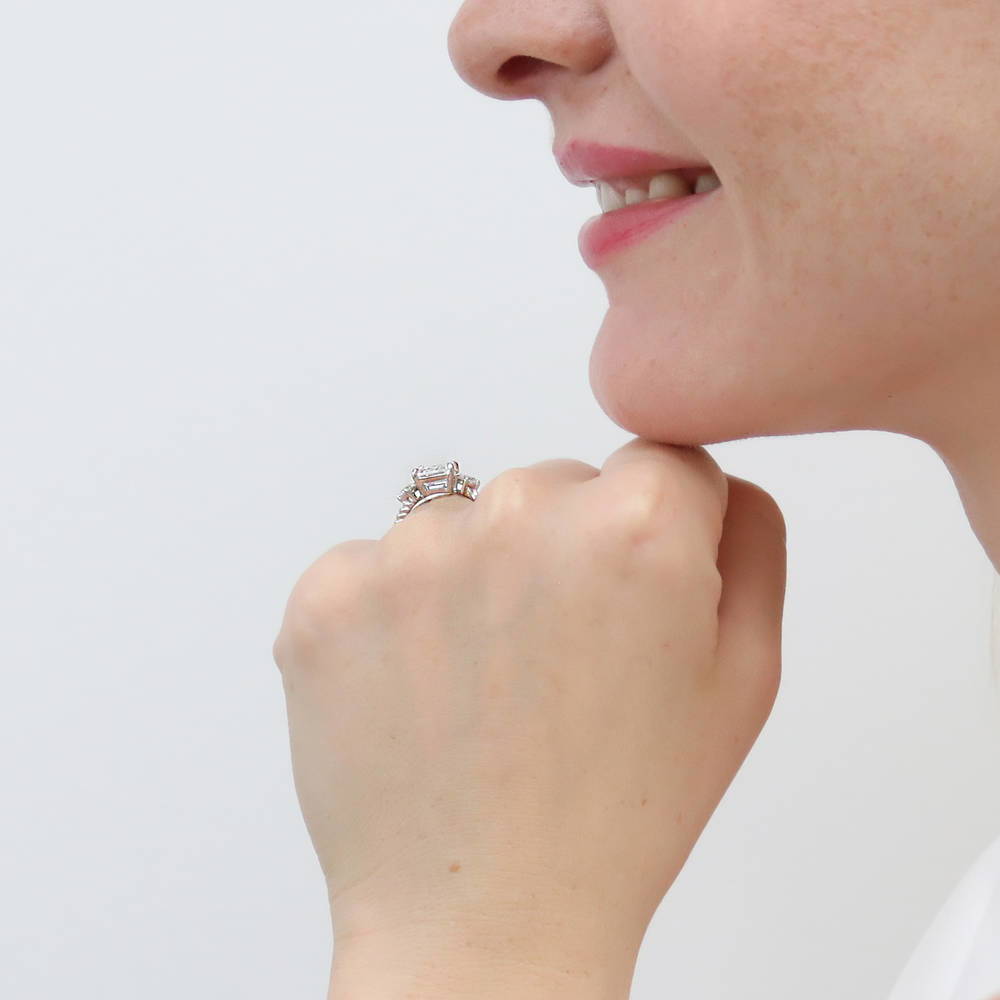 Model wearing 3-Stone Woven Emerald Cut CZ Ring in Sterling Silver, 3 of 10