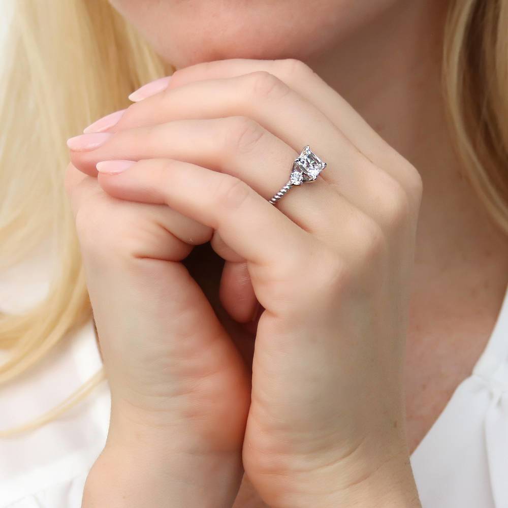 Model wearing 3-Stone Woven 2ct Princess CZ Ring in Sterling Silver, 6 of 10