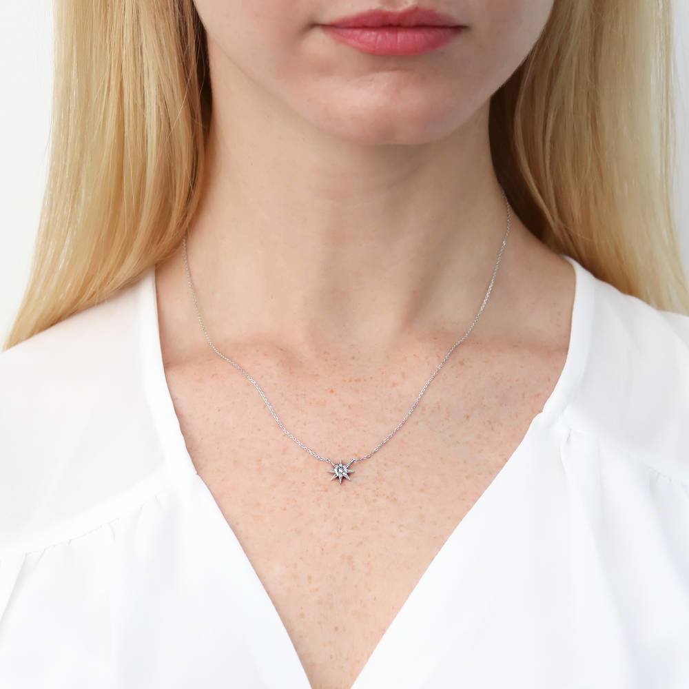 Model wearing Starburst CZ Pendant Necklace in Sterling Silver, 2 of 6