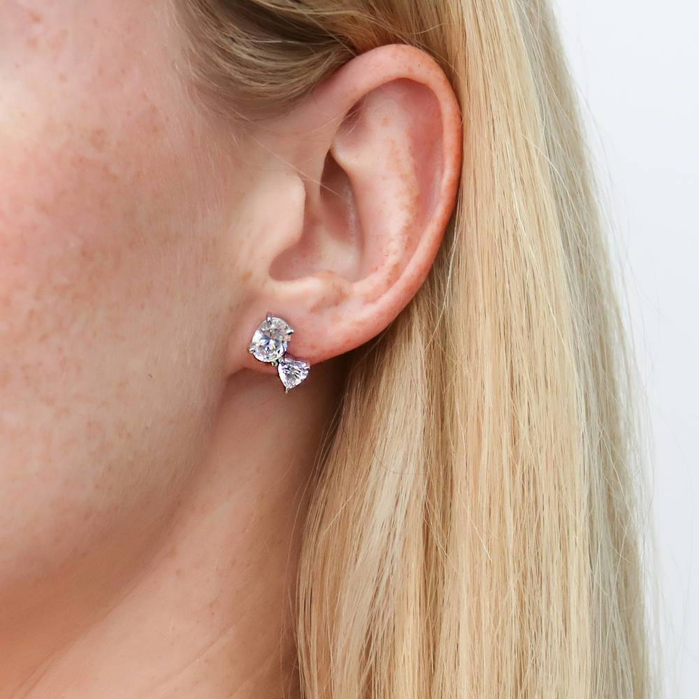 Model wearing 2-Stone CZ Stud Earrings in Sterling Silver, 2 of 4