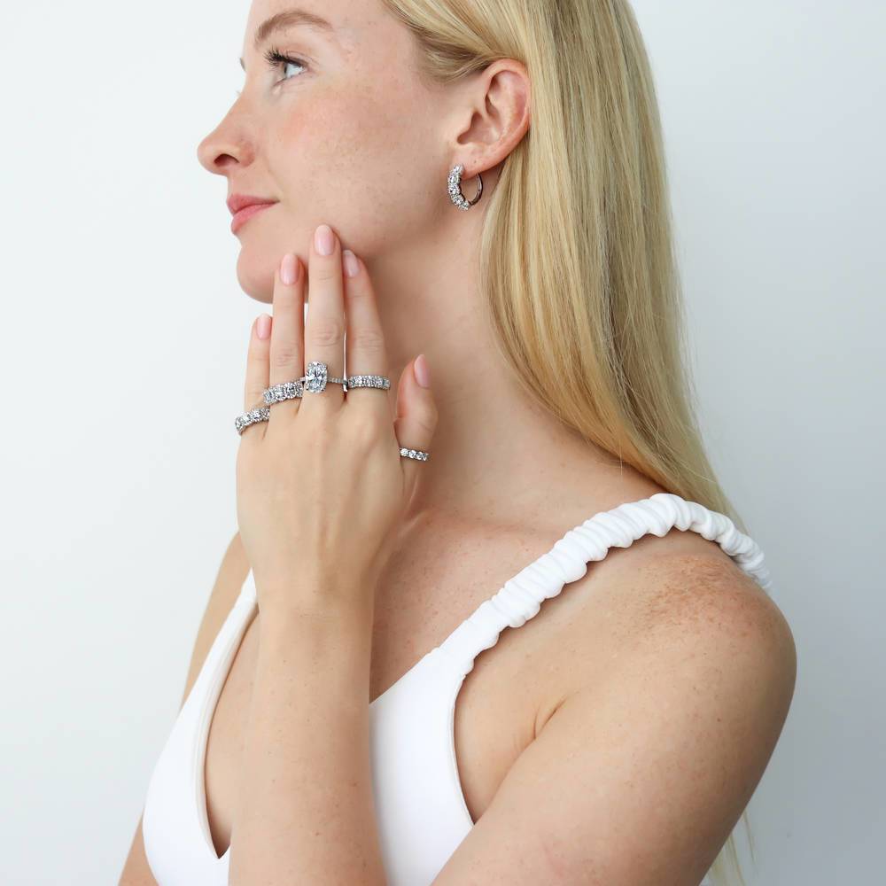Image Contain: Model Wearing 5-Stone Band, 5-Stone Hoop Earrings, 5-Stone Ring, Solitaire with Side Stones Ring
