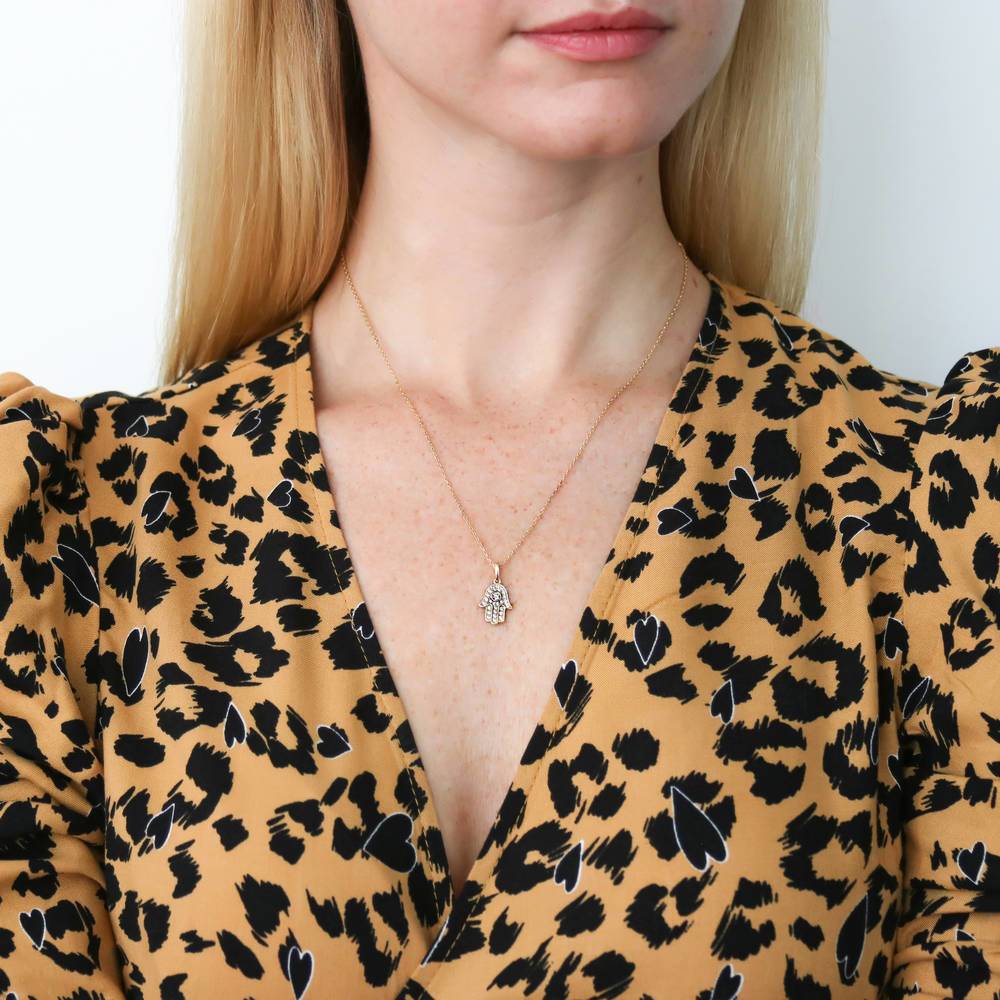 Model wearing Hamsa Hand CZ Chain Necklace in Gold Flashed Sterling Silver, 2 Piece, 5 of 17