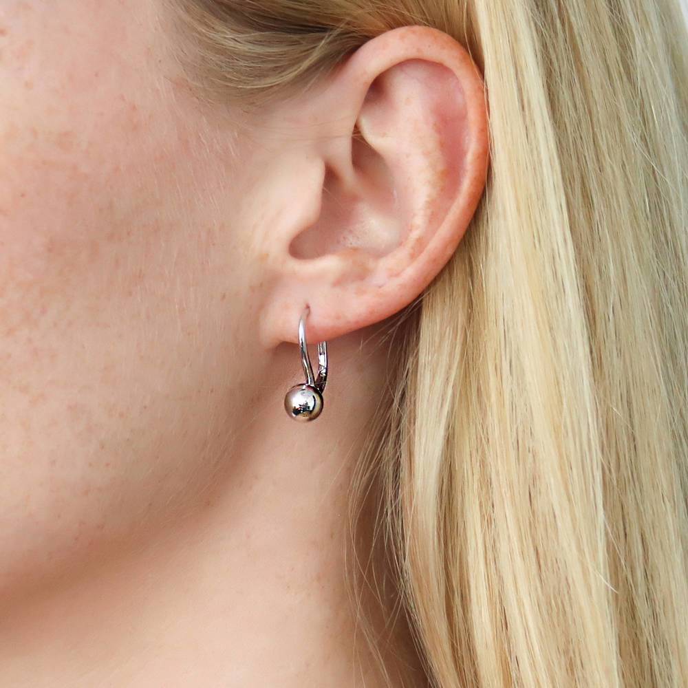 Model wearing Ball Bead Leverback Earrings in Sterling Silver, 3 of 5