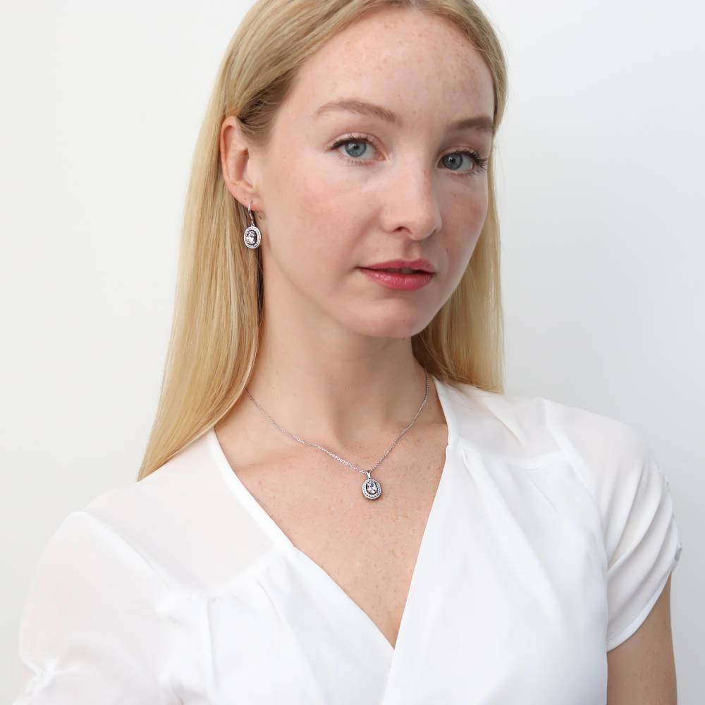 Model wearing Halo Woven Oval CZ Fish Hook Earrings in Sterling Silver, 4 of 6