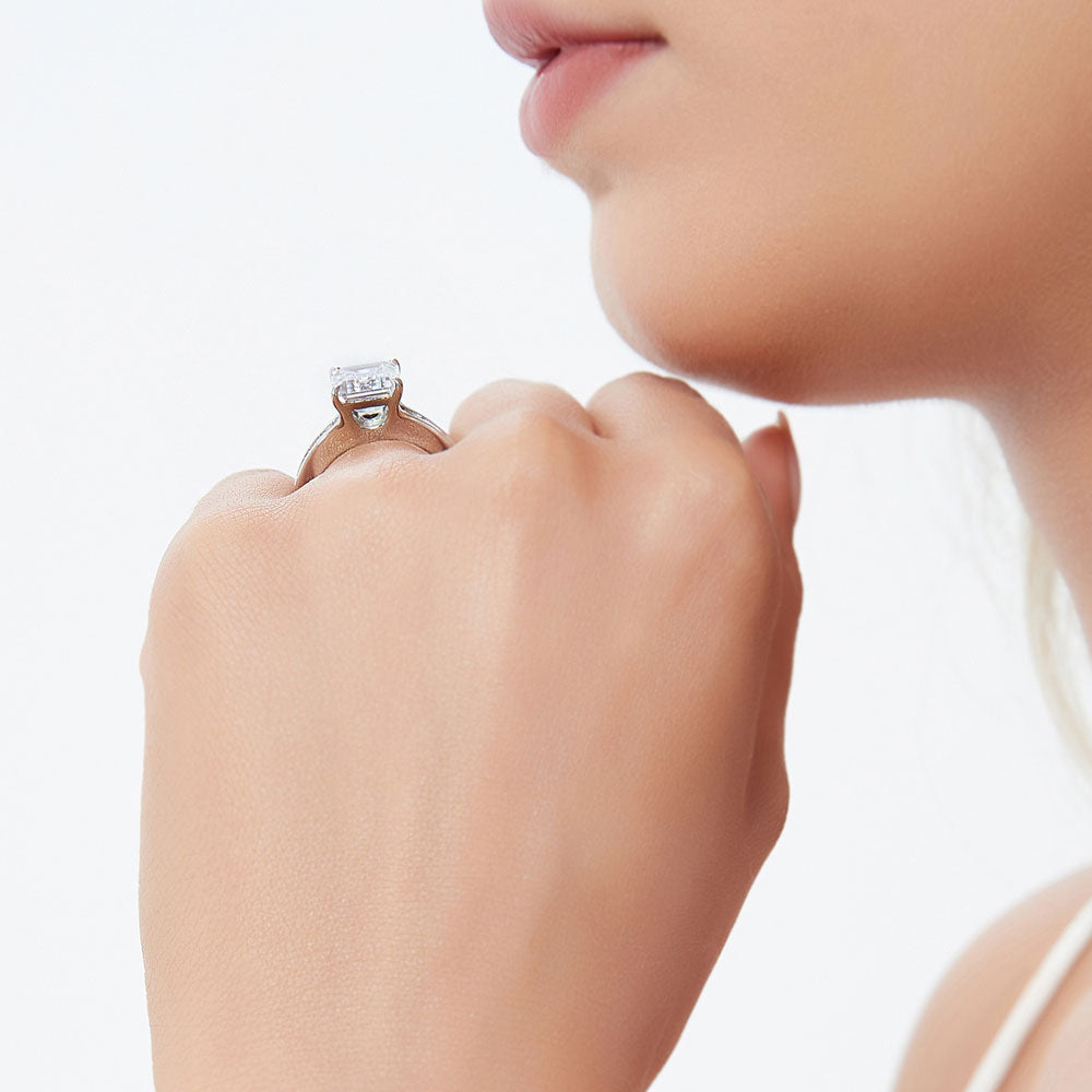 Model wearing Solitaire 3.8ct Emerald Cut CZ Ring in Sterling Silver, 7 of 9