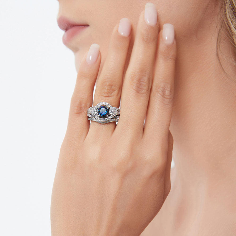 Model wearing 3-Stone Simulated Blue Sapphire Round CZ Ring Set in Sterling Silver, 5 of 17