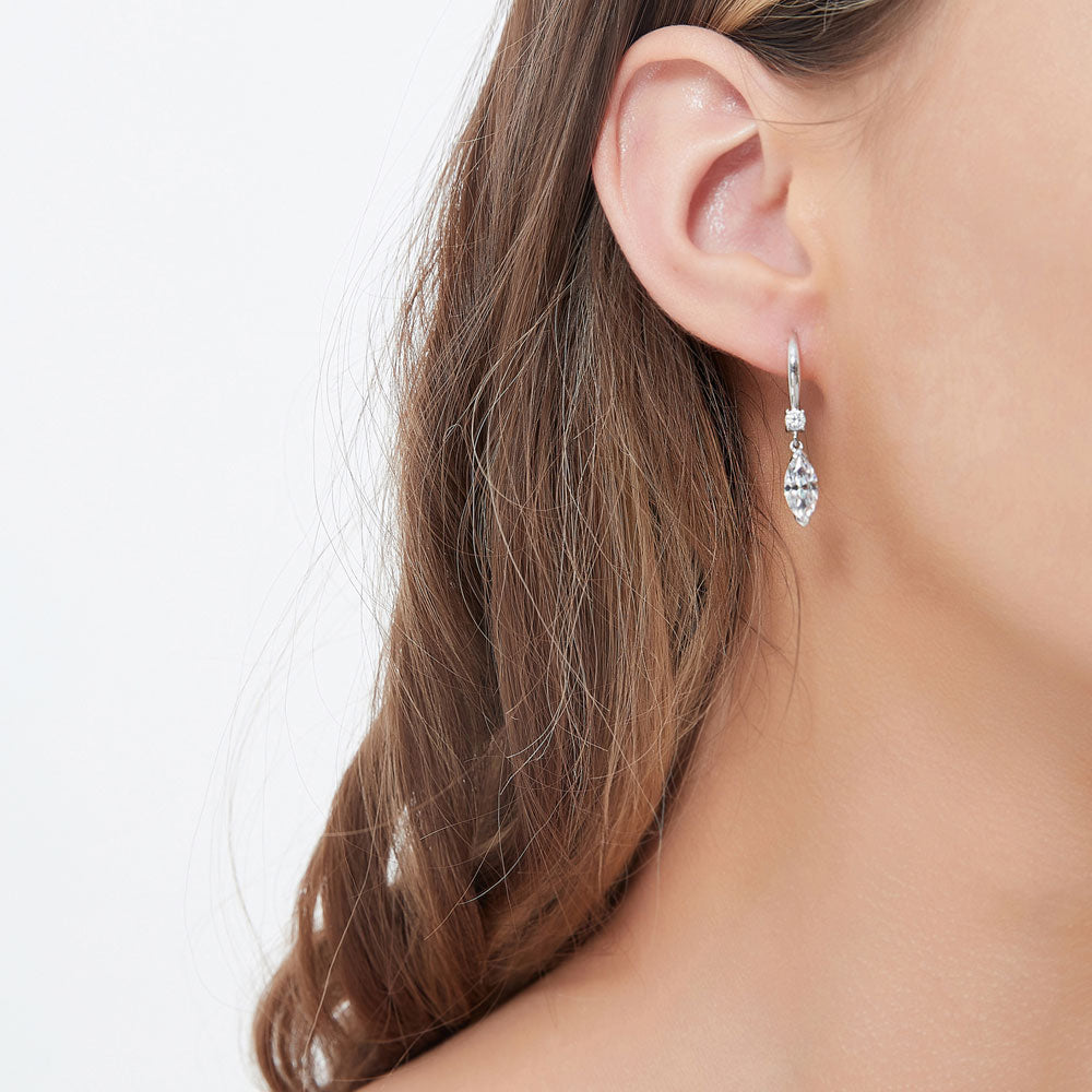 Model wearing Solitaire 2ct Marquise CZ Leverback Dangle Earrings in Sterling Silver, 2 of 6