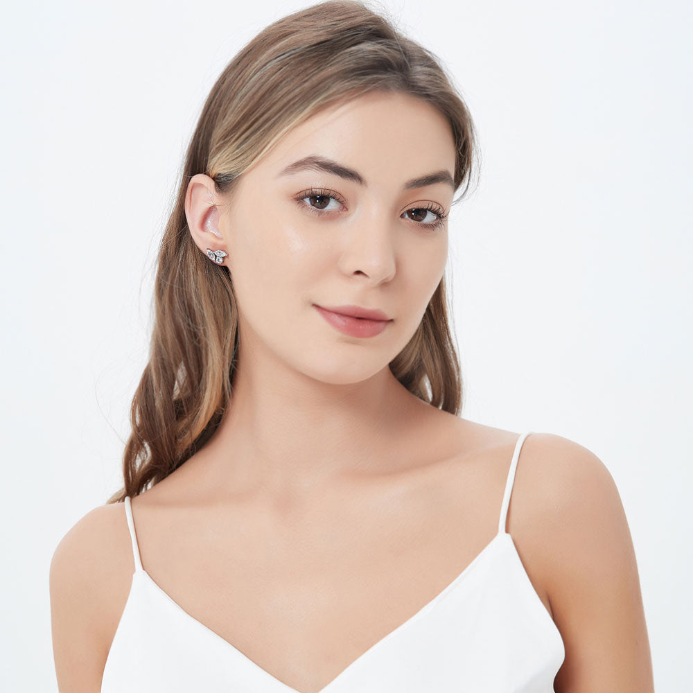 Model wearing 3-Stone Cluster Marquise CZ Stud Earrings in Sterling Silver, 3 of 4