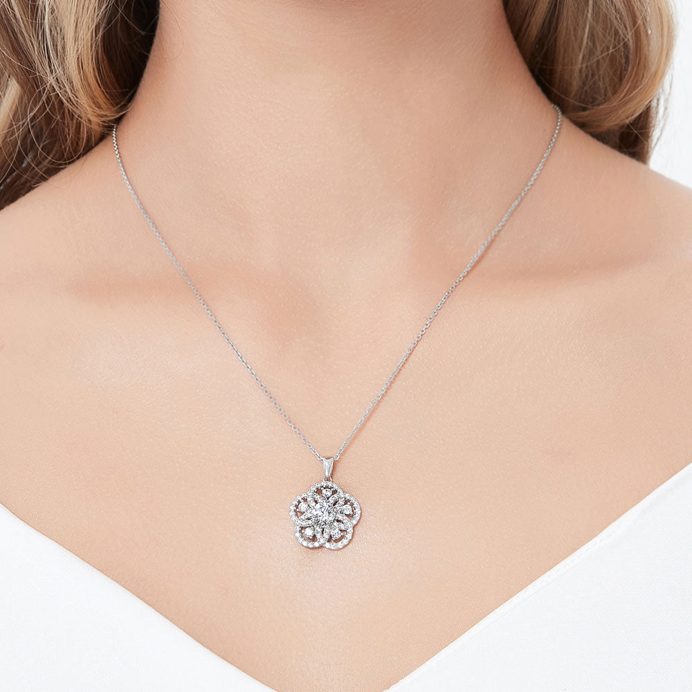 Model wearing Flower CZ Pendant Necklace in Sterling Silver, 2 of 7