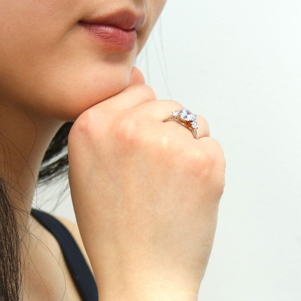 Model wearing 3-Stone Round CZ Ring in Sterling Silver, 6 of 9
