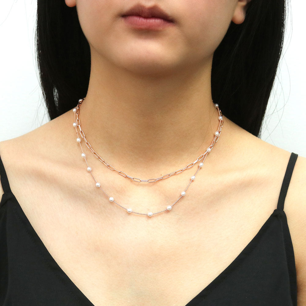 Model wearing Paperclip Imitation Pearl Chain Necklace in Base Metal, 2 Piece, 2 of 16