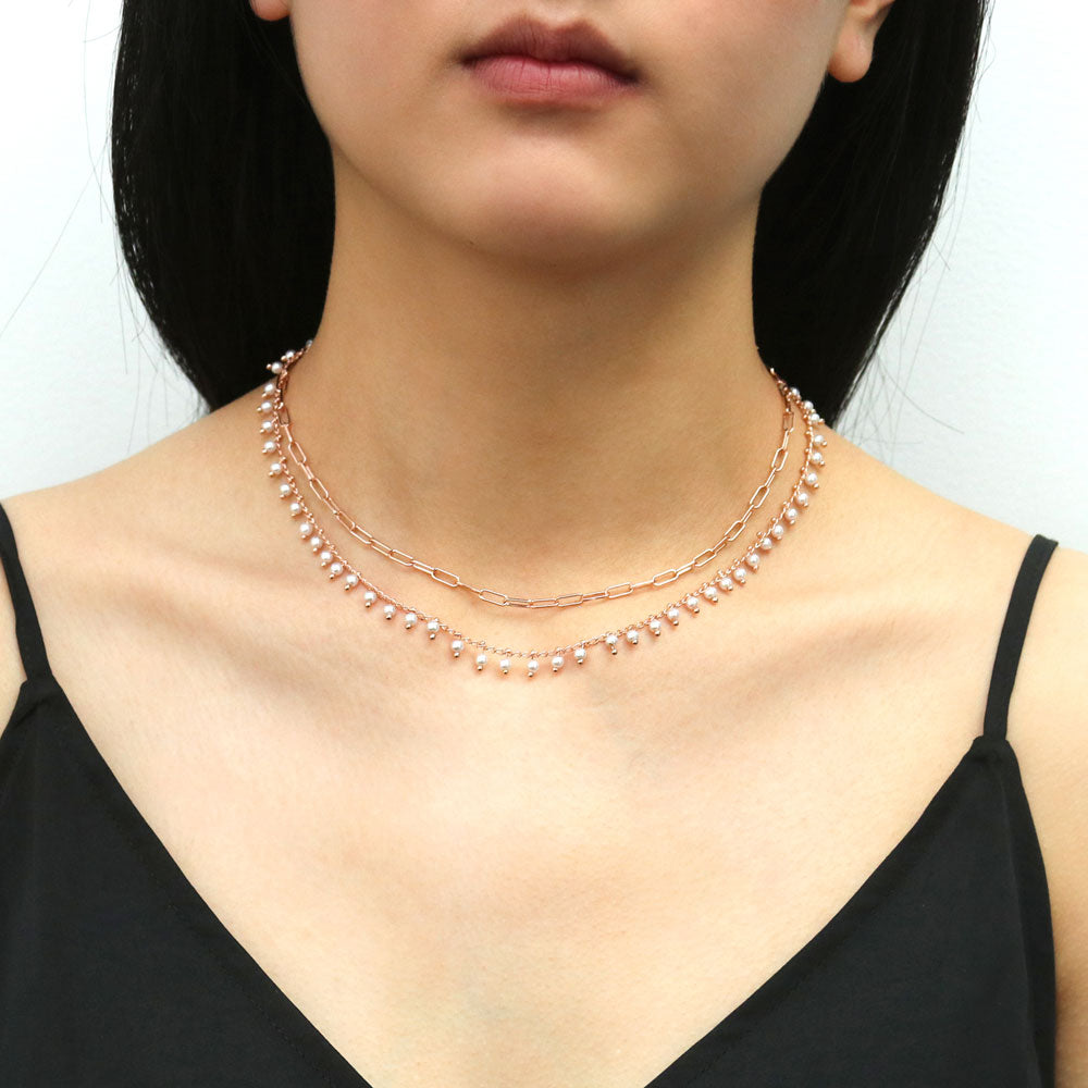 Model wearing Paperclip Imitation Pearl Chain Necklace in Base Metal, 2 Piece, 2 of 15