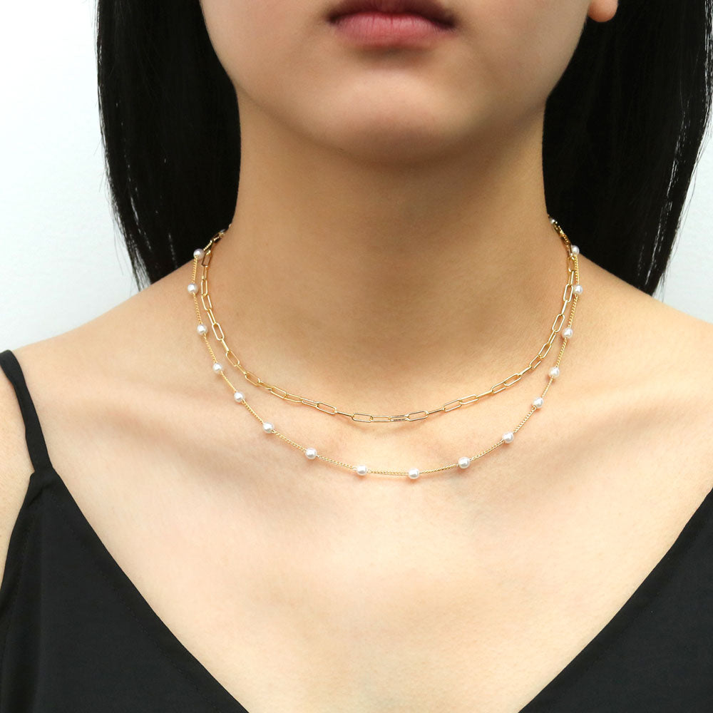 Model wearing Paperclip Imitation Pearl Chain Necklace in, 2 Piece, 2 of 19