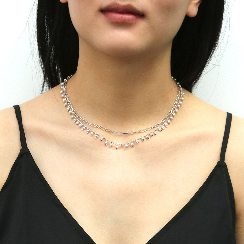 Model wearing Paperclip Imitation Pearl Chain Necklace in Silver-Tone, 2 Piece, 15 of 17