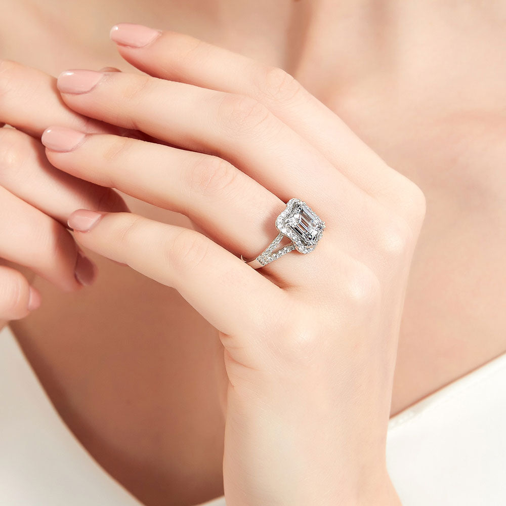 Model wearing Halo Woven Step Emerald Cut CZ Split Shank Ring in Sterling Silver, 3 of 10