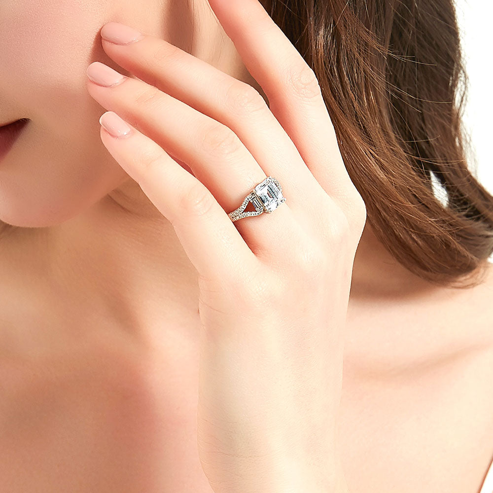 Model wearing Solitaire 2.6ct Step Emerald Cut CZ Split Shank Ring in Sterling Silver, 6 of 9