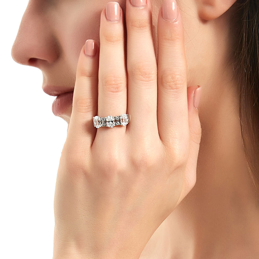 Model wearing 3-Stone Art Deco Oval CZ Statement Ring in Sterling Silver, 3 of 12