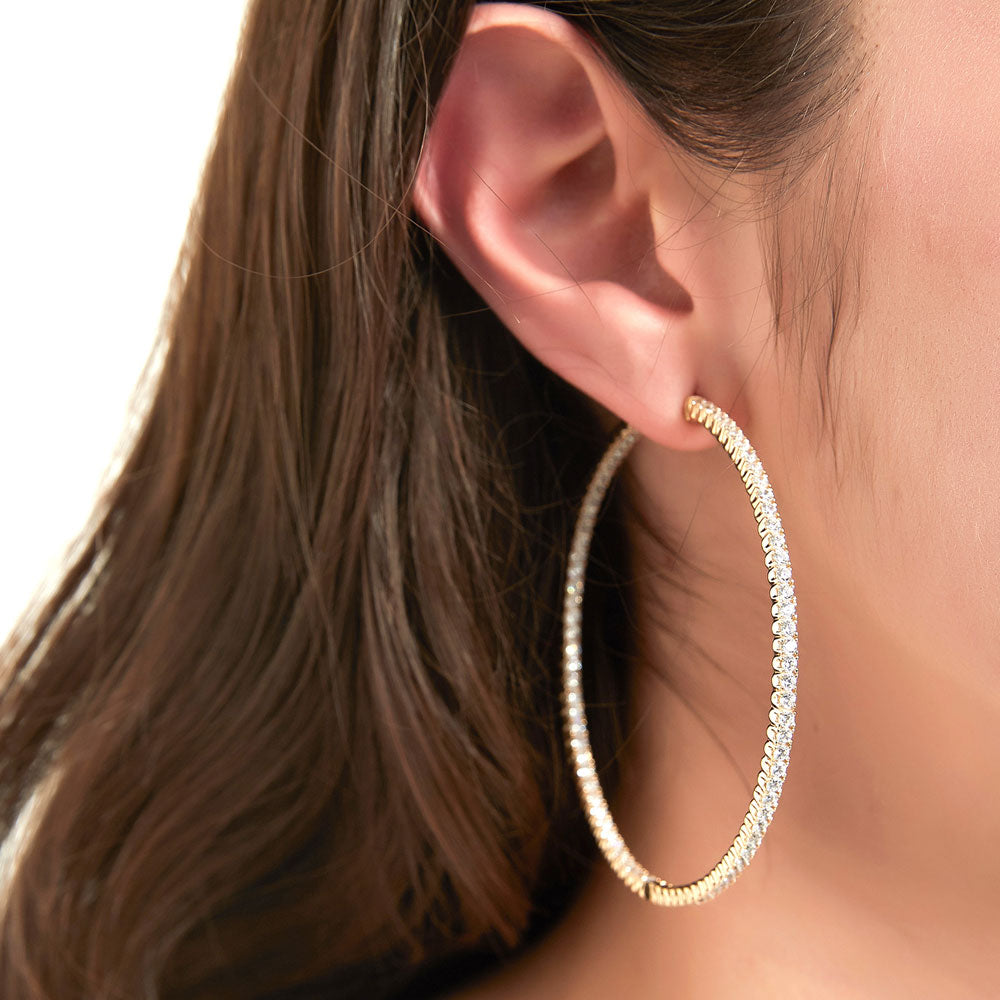 Model wearing CZ Large Inside-Out Hoop Earrings in Sterling Silver 2.5 inch, 9 of 18
