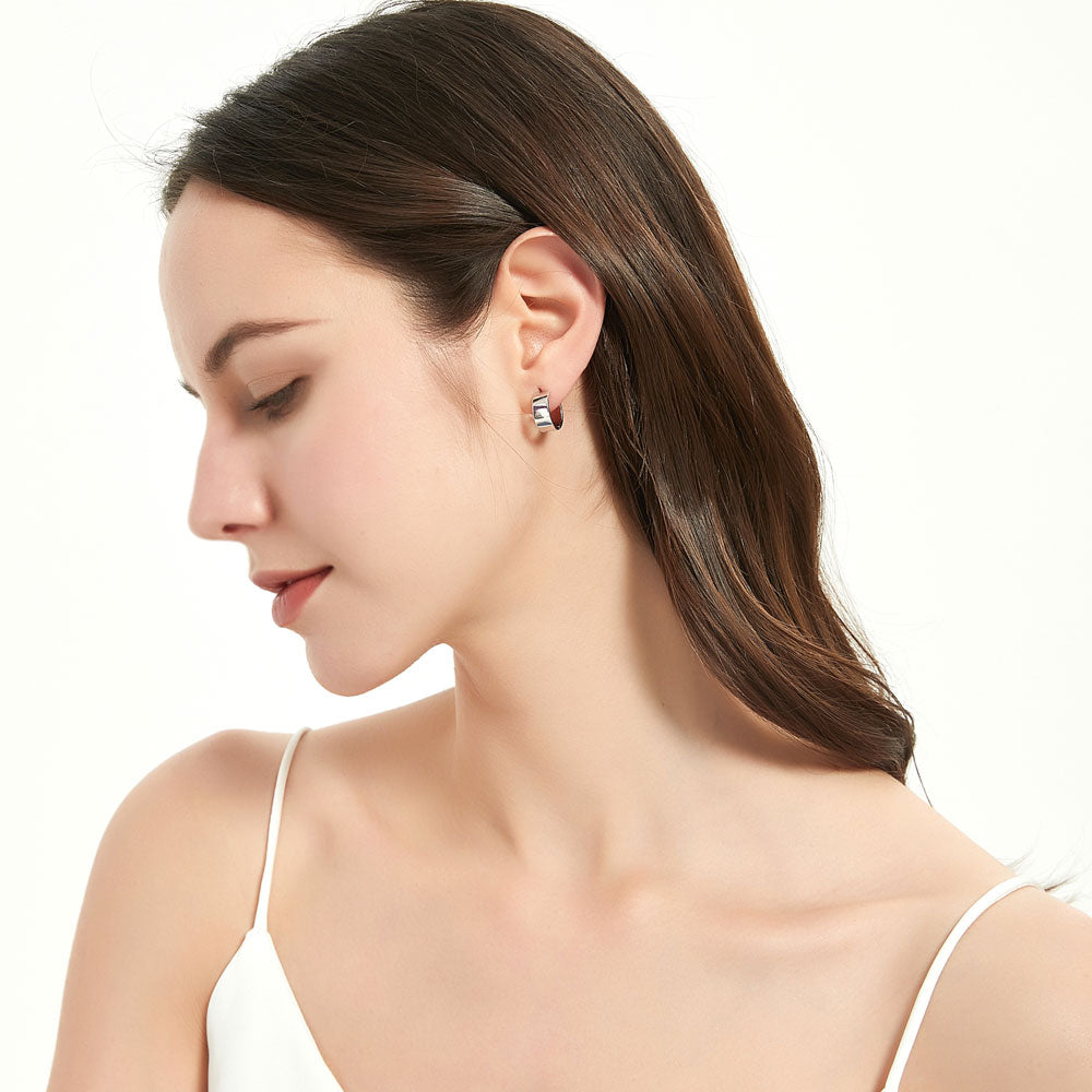 Model wearing Small Huggie Earrings in Sterling Silver 0.55 inch, 8 of 10
