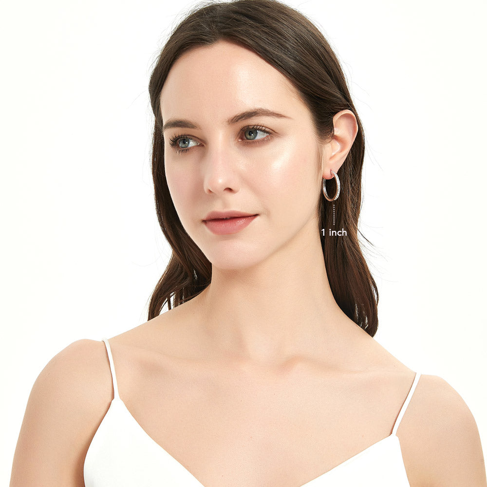 Model wearing Bar CZ Hoop Earrings in Sterling Silver, 8 of 15