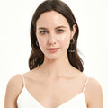 Model wearing Bar CZ Small Hoop Earrings in Sterling Silver, 1 inch