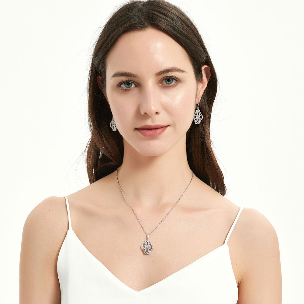 Model wearing Flower Art Deco CZ Fish Hook Earrings in Sterling Silver, 3 of 4
