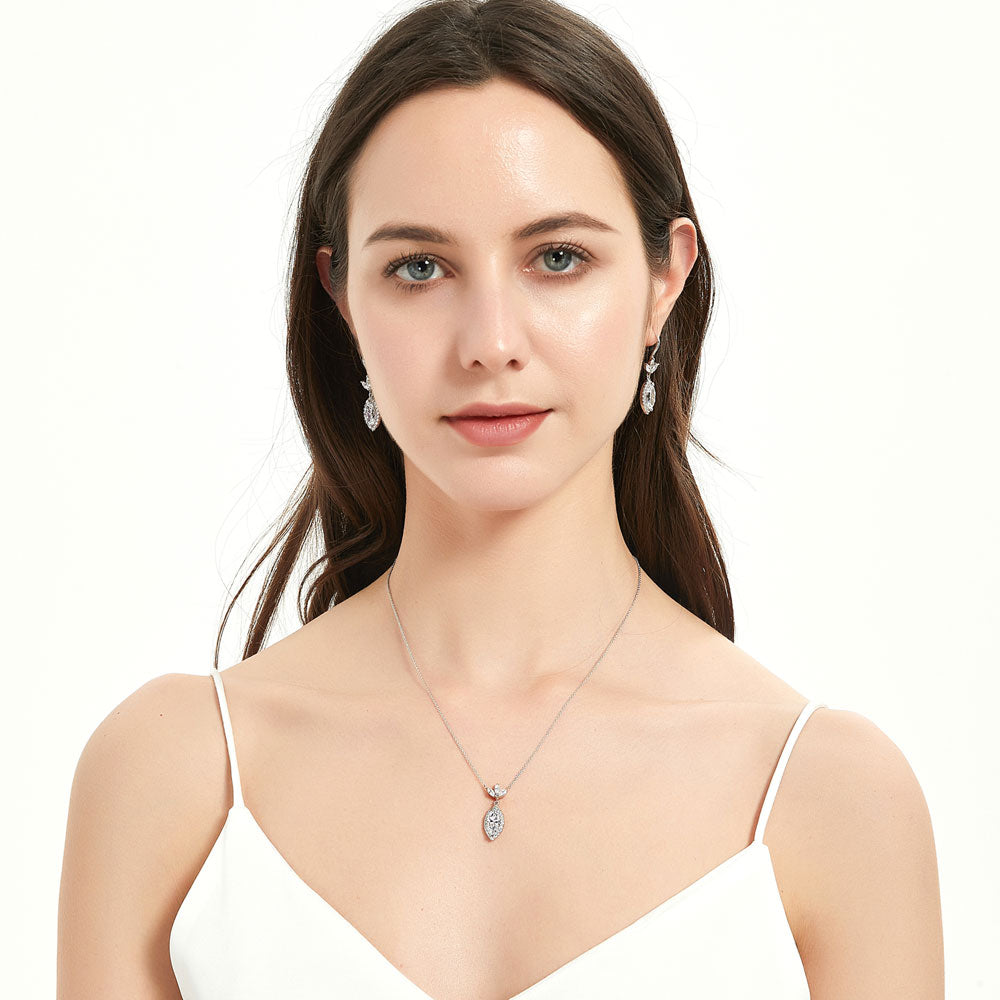 Model wearing Halo Flower Marquise CZ Pendant Necklace in Sterling Silver, 3 of 6
