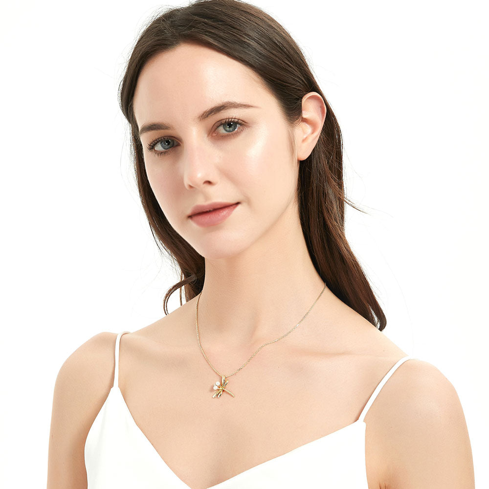 Model wearing Dragonfly White Button Cultured Pearl Necklace in Sterling Silver, 3 of 6