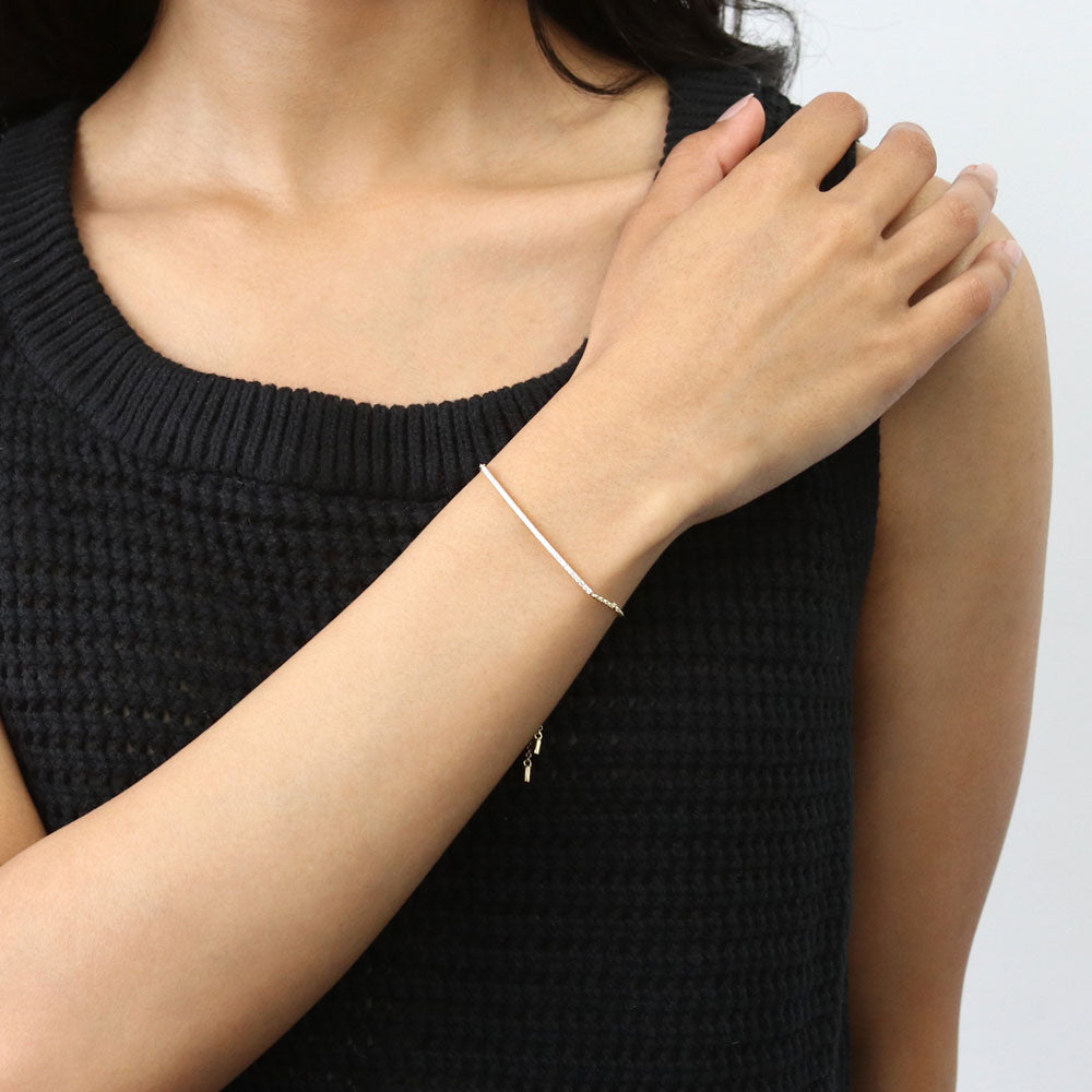 Model wearing Bar CZ Chain Bracelet in Gold Flashed Sterling Silver, 3 of 6