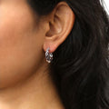 Model wearing Woven Small Hoop Earrings in Sterling Silver 0.7 inch, Yellow Gold Flashed