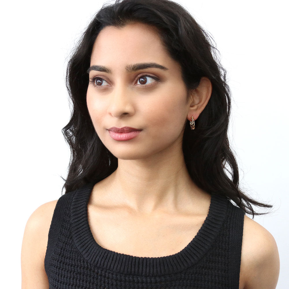 Model wearing Woven Small Hoop Earrings in Sterling Silver 0.7 inch, Yellow Gold Flashed