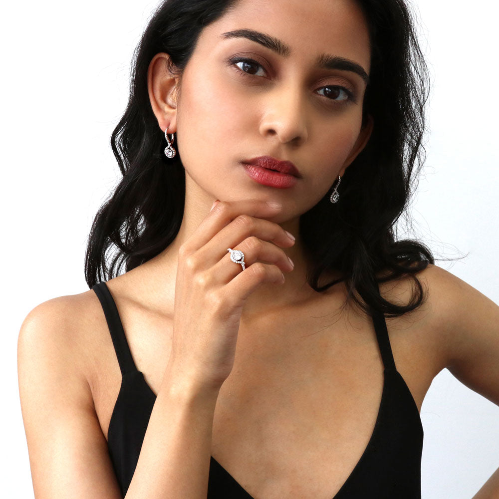 Model wearing Halo Woven Round CZ Leverback Dangle Earrings in Sterling Silver, 6 of 7