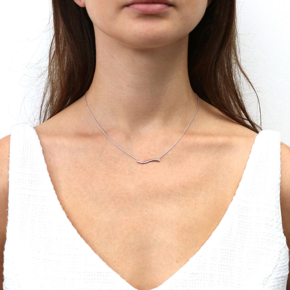 Model wearing Wave Pendant Necklace in Sterling Silver, 2 of 7