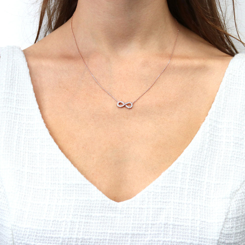 Model wearing Infinity CZ Pendant Necklace in Rose Gold Flashed Sterling Silver, 2 of 6