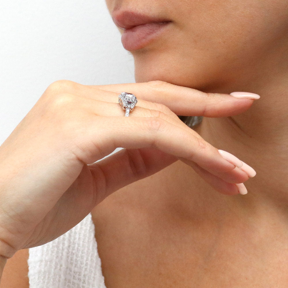 Model wearing 3-Stone Halo Art Deco 2ct Cushion CZ Ring in Sterling Silver, 7 of 12