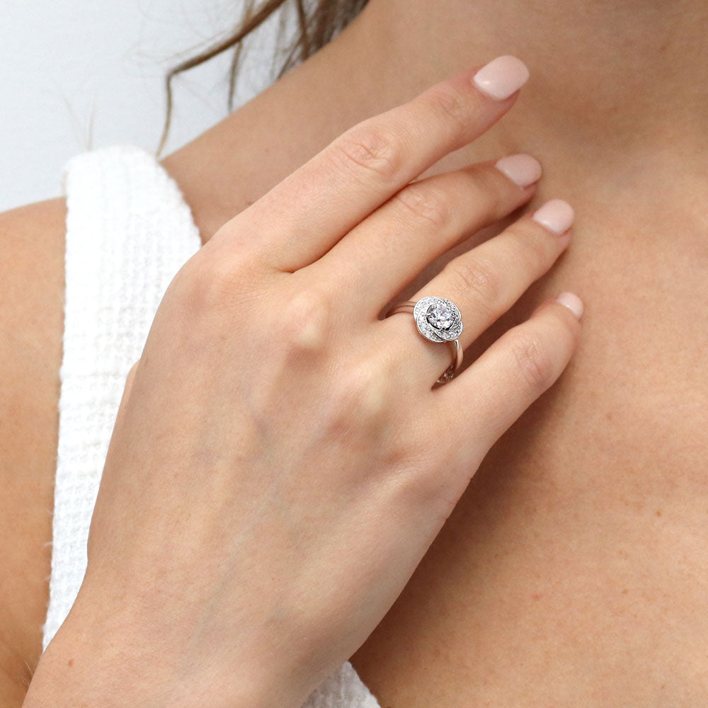 Model wearing Flower Woven Halo CZ Ring in Sterling Silver, 2 of 11