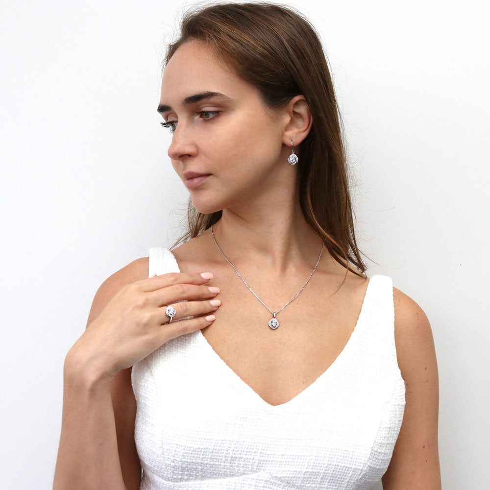 Model wearing Flower Halo CZ Necklace and Earrings Set in Sterling Silver, 5 of 12