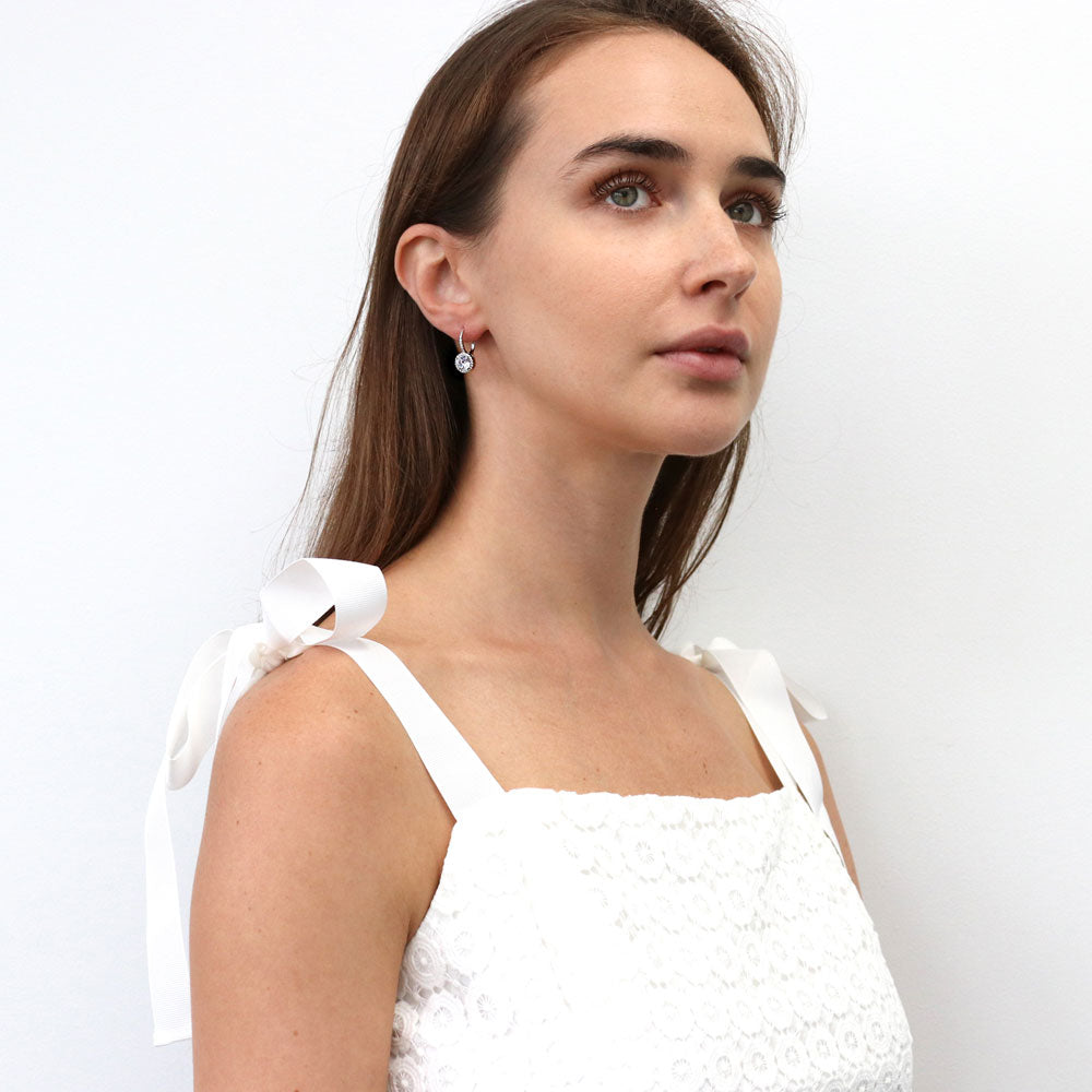 Model wearing Solitaire 2.5ct CZ Leverback Earrings in Sterling Silver, 3 of 5