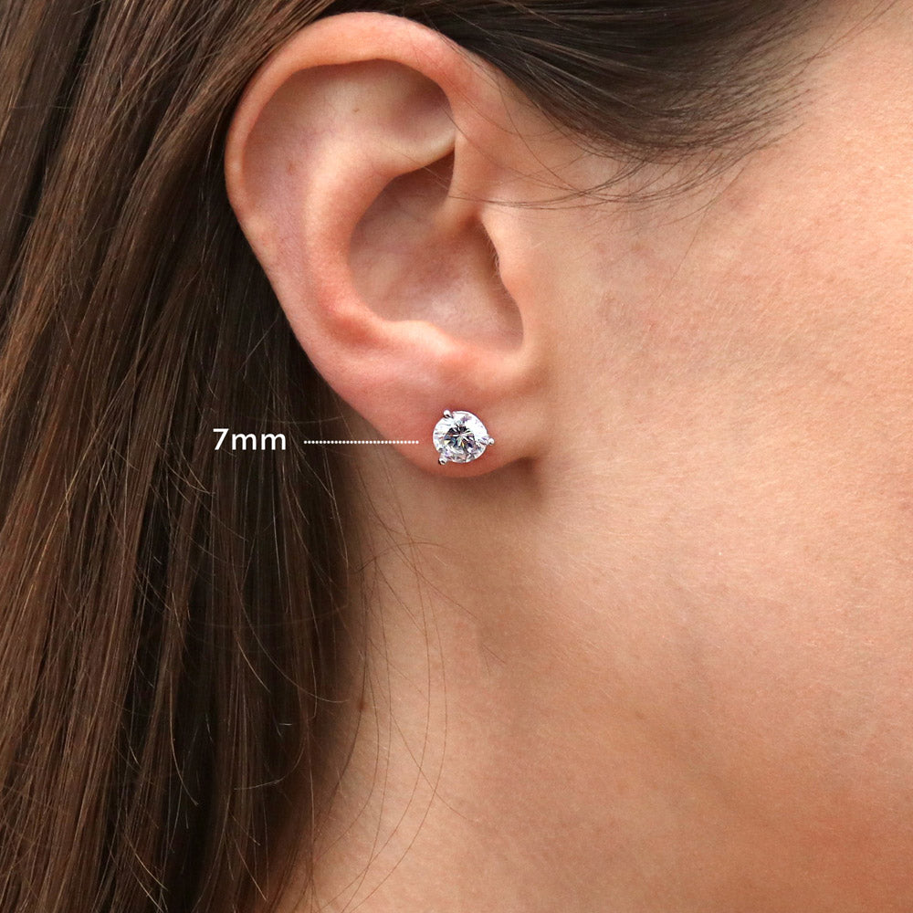 Model wearing Solitaire Round CZ Stud Earrings in Sterling Silver, 5 of 9