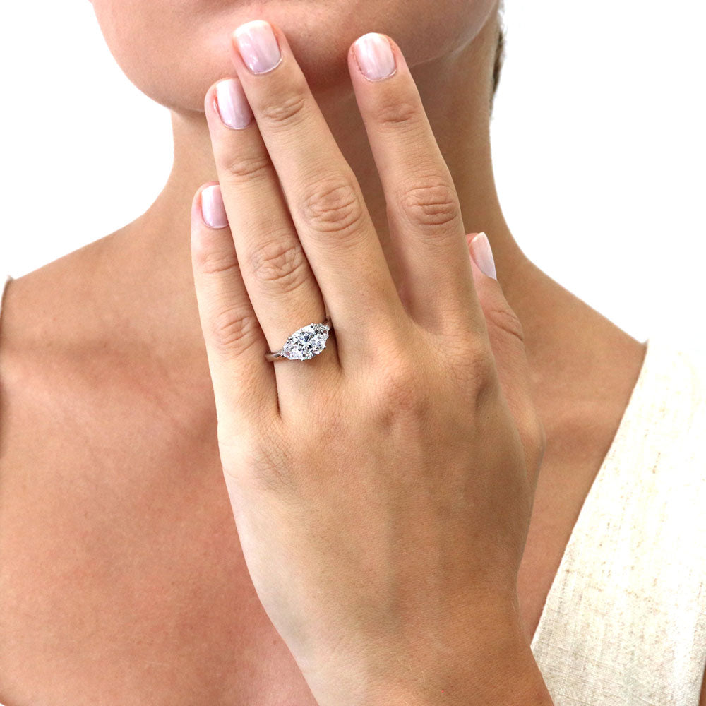 Model wearing 3-Stone Cushion CZ Ring in Sterling Silver, 2 of 10