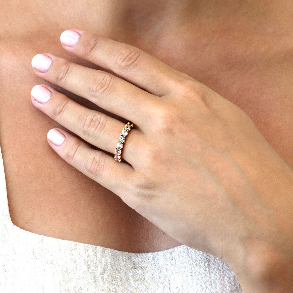Model wearing Pave Set CZ Eternity Ring in Gold Flashed Sterling Silver, 2 of 9